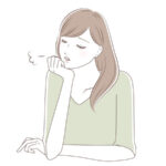 溜息をする女性
